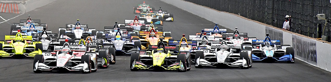 indy cars racing to through the start line Spokane