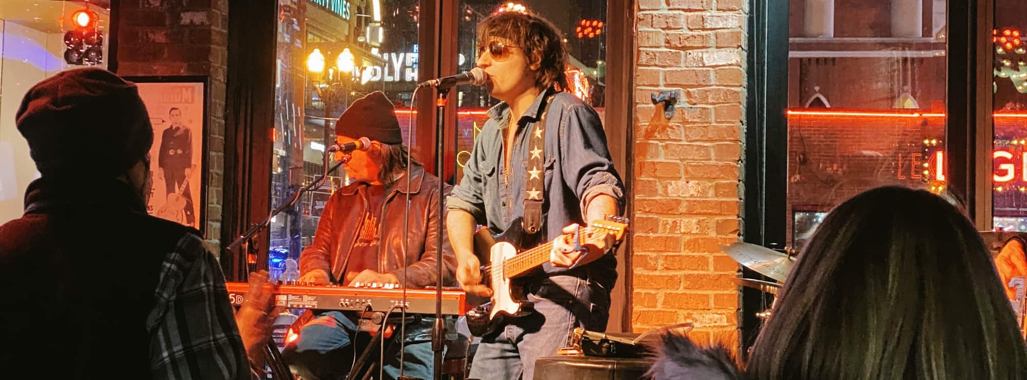 bar singer on guitar in Spokane